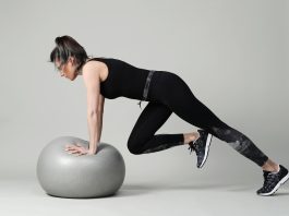 5 Pilates Ball Exercises That Will Take The Edge Off Your Back Pain